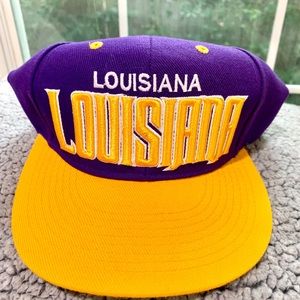 NWOT: LOUISIANA PURPLE/GOLD ADJUSTABLE HAT